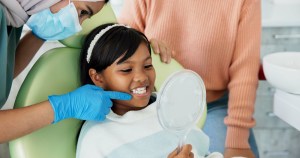 Young girl in exam chair